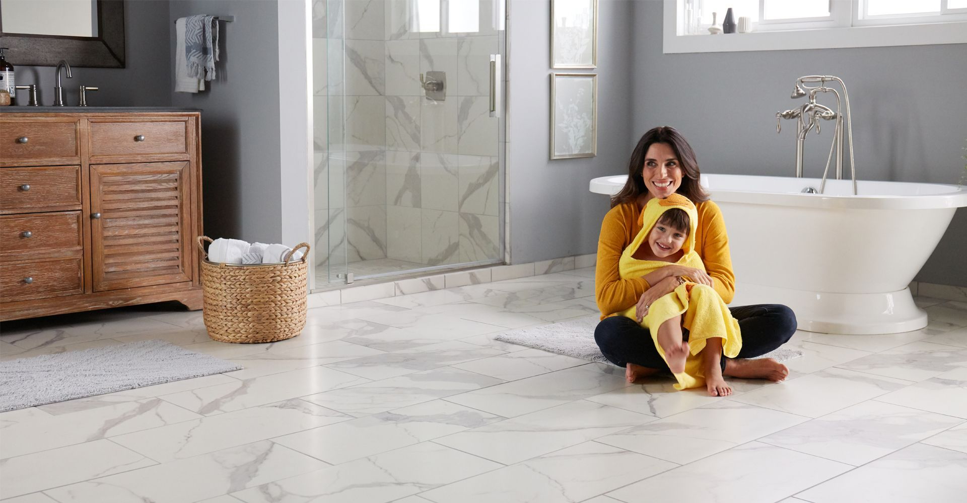 kids playing on newly installed Carpet One vinyl flooring in playroom